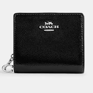 Coach black patent leather wallet with silver hardware.